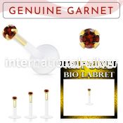bioflex labret with push in 10kt gold w prong garnet
